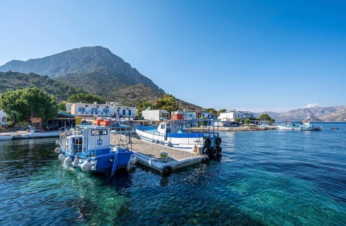 Boats in the small harbour of Telendos