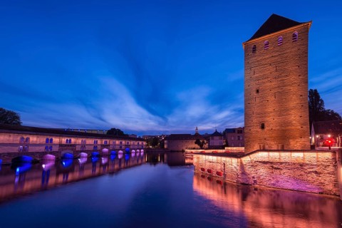 Ponts couverts and Barrage Vauban over ILL canal at sunset