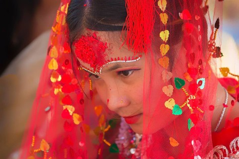 Nepalese bride from the Tharu ethnic group in traditional dress