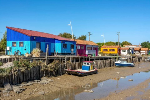 Colourful cabins oyster farmers