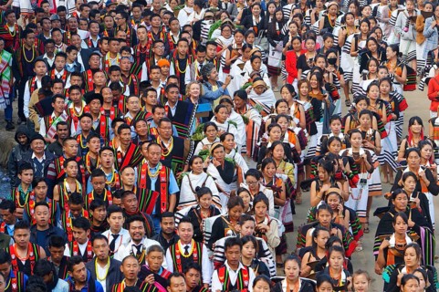 Naga tribesmen participating in the stone-pulling ceremony during the Kisima Nagaland Hornbill Festival
