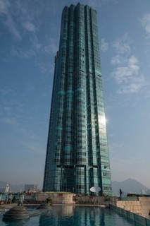 Pool on a roof terrace with the skyscraper of the Harbour Grand Kowloon Hotel