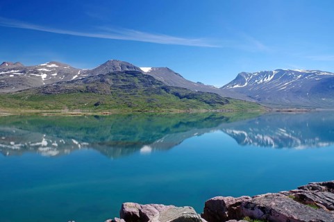 Mountains reflected in the fjord
