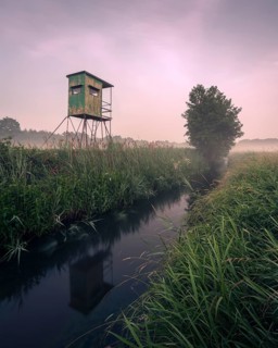 German floodplain landscape in Brandenburg with high seat on the Nuthe