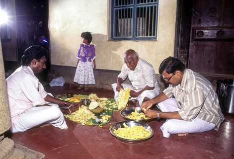 Nattukottai Chettiars Nagarathars to separate the jack fruit to distribute it to the guests of wedding feast in Chettinad