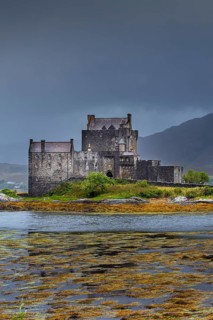 Eilean Donan Castle in Loch Duich during a rainstorm