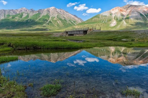 Mountains reflected in the water