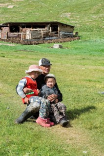 Kyrgyz man with his two children