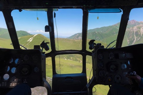 Aerial view from a helicopter cockpit over the central Tian Shan Mountains