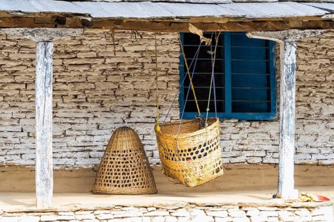 Cradle hanging in front of a house