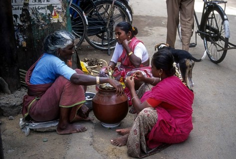 An old woman selling Neera at Madurai