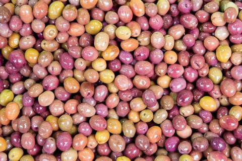 Macro view of olives as background in spice bazaar