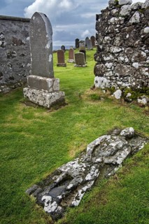 Stone grave slab of Angus Martin on the Kilmuir Cemetery