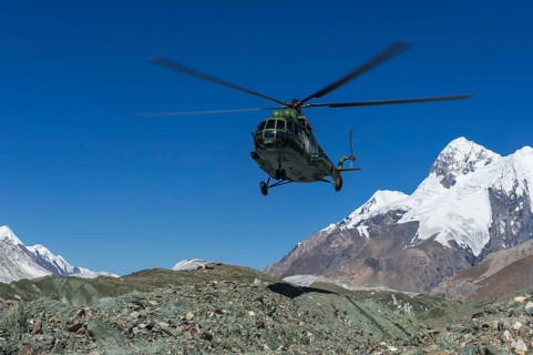 Helicopter landing at Khan Tengri Base Camp