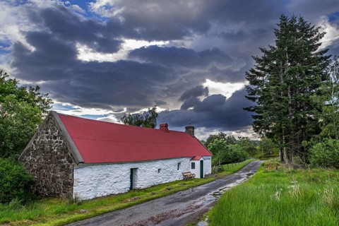 Moirlanich Longhouse 19th century lime-framed Scottish cottage with cattle shed in Glen Lochay near Killin