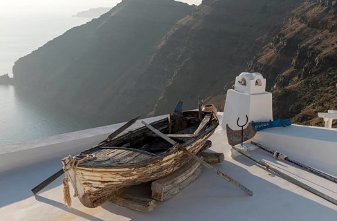Old rowing boat on terrace roof