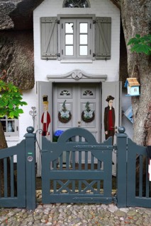 Artfully designed entrance to an old Frisian house