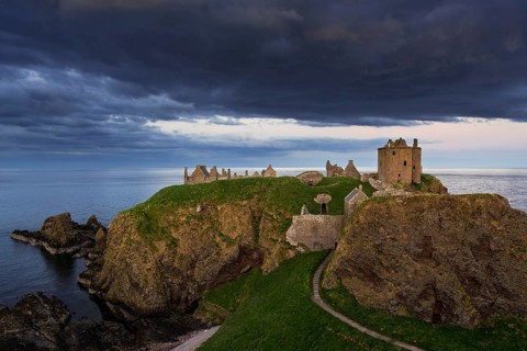 Menacing dark clouds above Dunnottar Castle