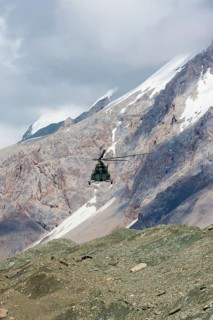 Helicopter landing at Khan Tengri Base Camp