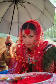 Nepalese bride from the Tharu ethnic group in traditional dress