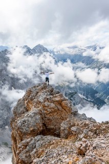 Hiker standing on a rock