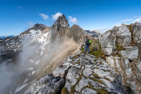 Hiker at the summit of the Westliche Toerlspitze