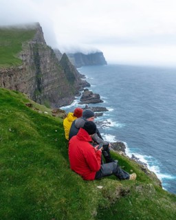 3 Walkers sitting overlooking Beinisforo Cliffs