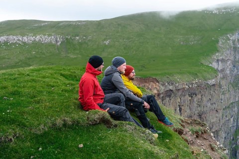 3 Walkers sitting overlooking Beinisforo Cliffs