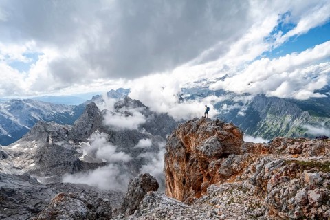 Hiker standing on a rock