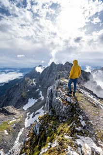 Hiker at the summit of the Westliche Toerlspitze