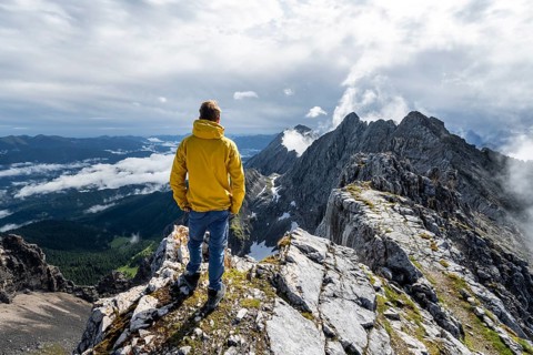 Hiker at the summit of the Westliche Toerlspitze