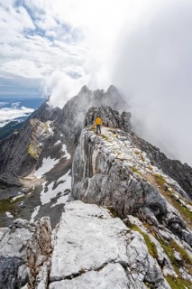 Hiker at the summit of the Westliche Toerlspitze