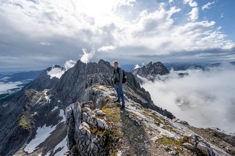 Hiker at the summit of the Westliche Toerlspitze