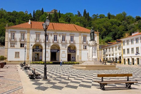 Town Hall in praca da Reublica and Templar Castle of Christ in the background