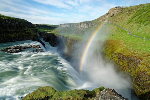 Rainbow over waterfall Gullfoss