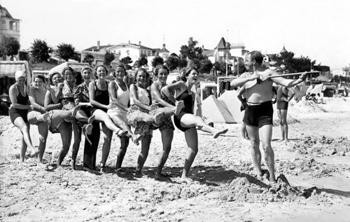 Group with bathers at the beach