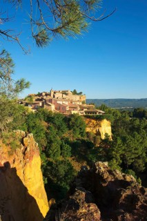 Ochre rocks with the old town of Roussillon