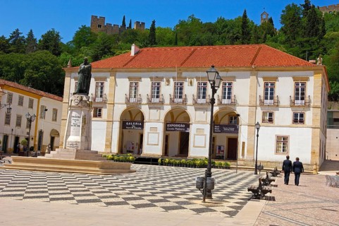 Town Hall in praca da Reublica and Templar Castle of Christ in the background