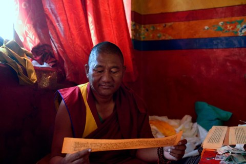 Monk in the prayer room