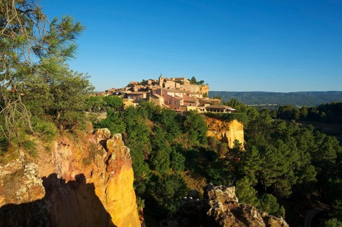 Ochre rocks with the old town of Roussillon