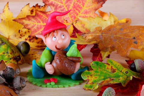 Marzipan gnome and autumn leaves