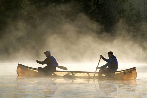 Canoeing in the morning mist