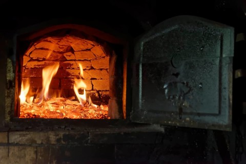 Heat up a stone oven