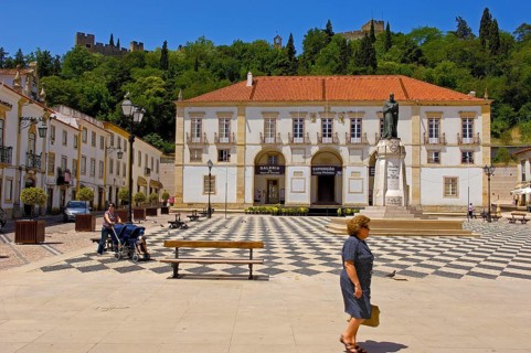 Town Hall in praca da Reublica and Templar Castle of Christ in the background
