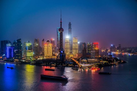 Pudong with Huangpu and Oriental Pearl Tower by night