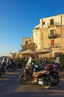 Vespas on the outskirts of the old town of Cefalu