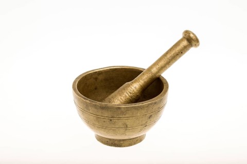 Mortar and pestle against a white background
