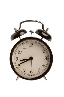 Alarm clock on white background