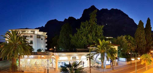 Viale Rovereto and Cina mountain range at sunset