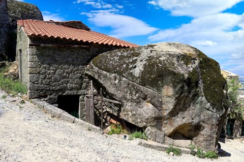 Old stone houses between rocks